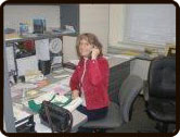 Jeanine at her desk